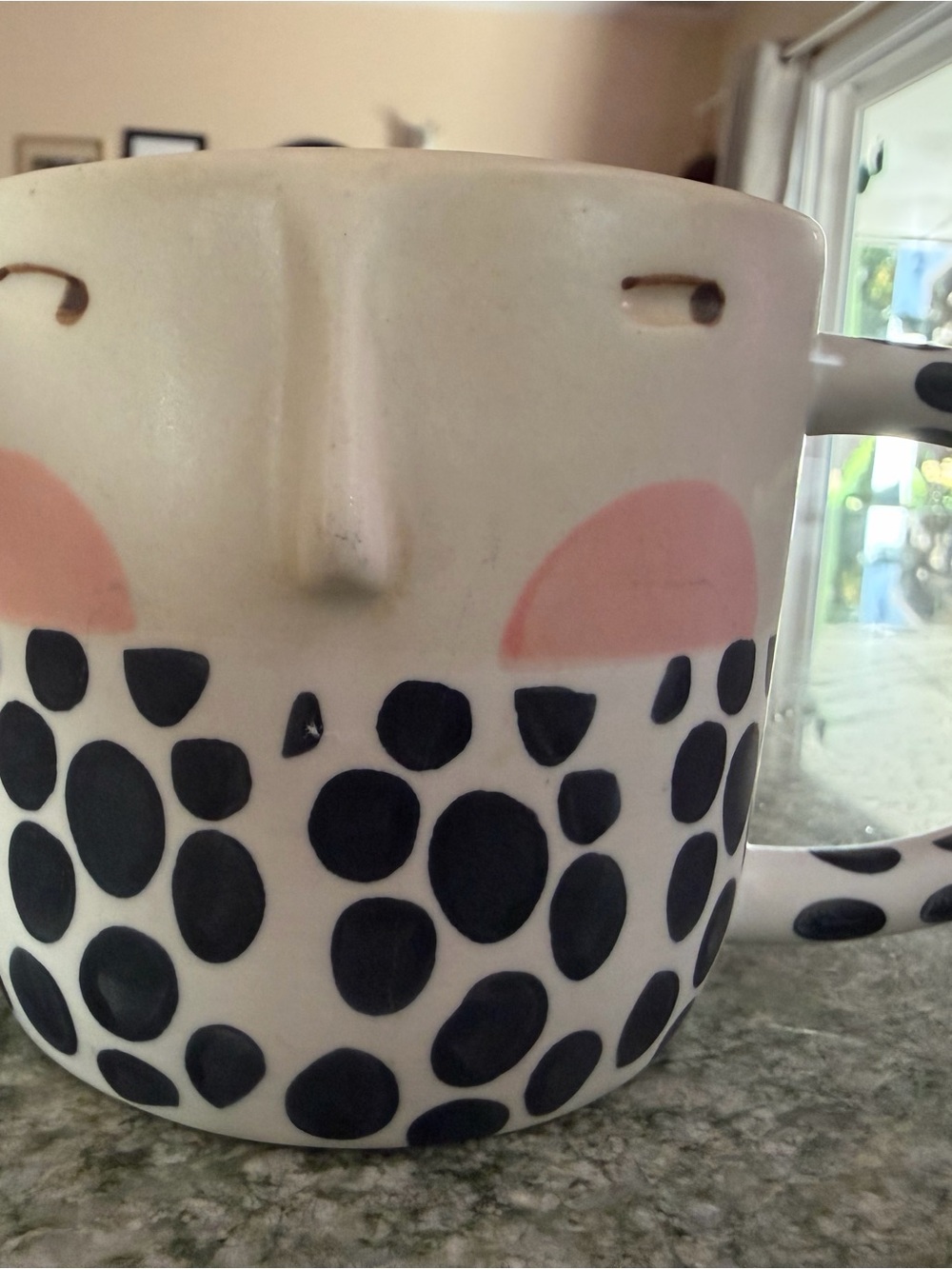 Anthropologie Cream Ceramic Face Mug with Black Dot Motif and Pink Cheeks